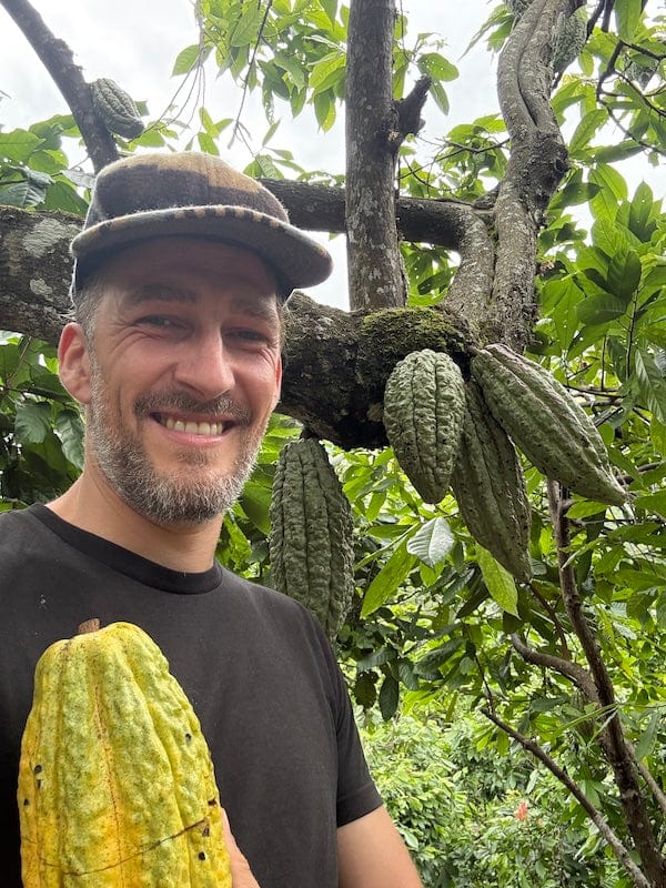 Image showing Jonas Ketterle, Ora Cacao's Founder, with some cacao trees in Colombia